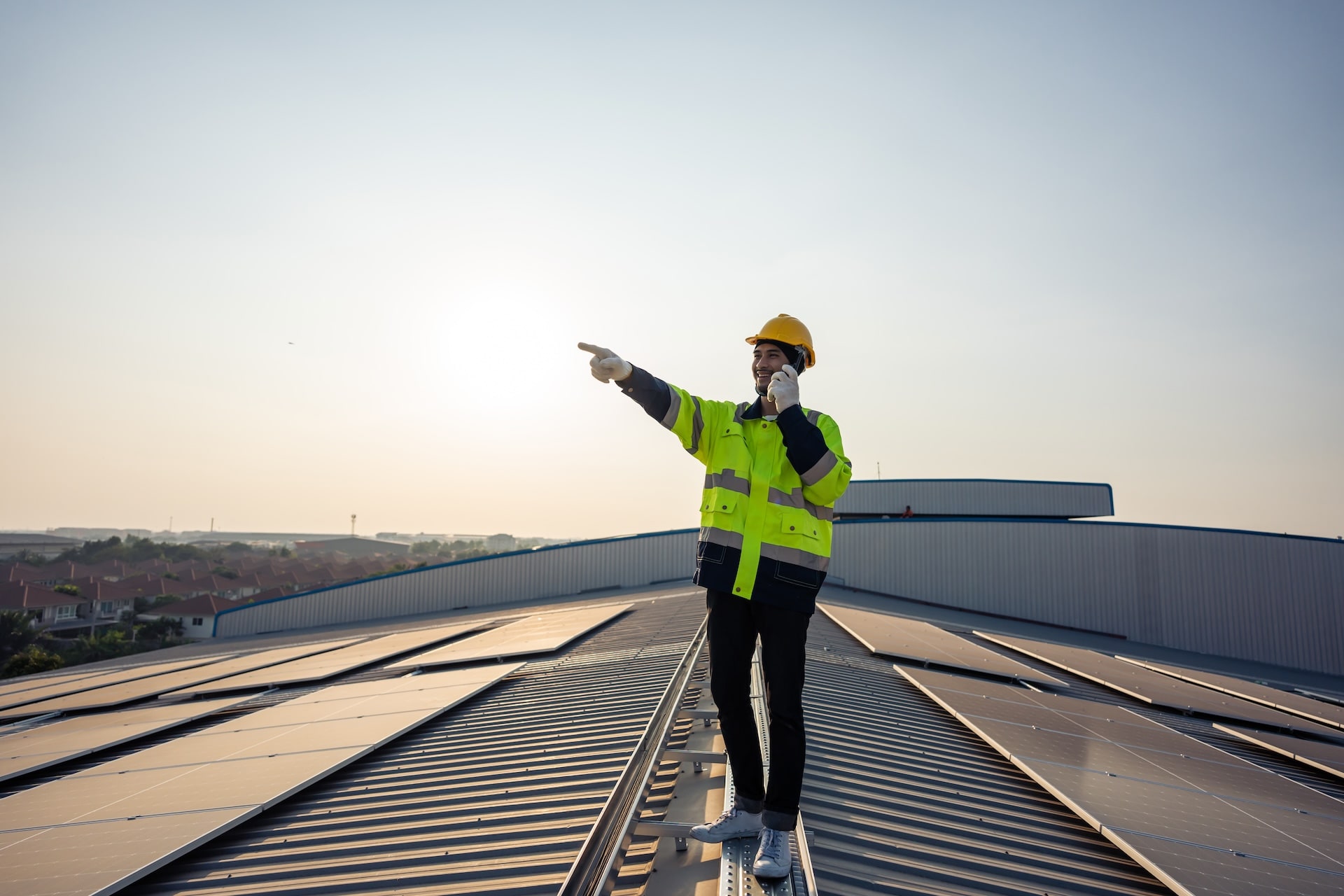 solar-panel-technician-on-phone-inspecting-rooftop-2026-03-25-01-21-38-utc