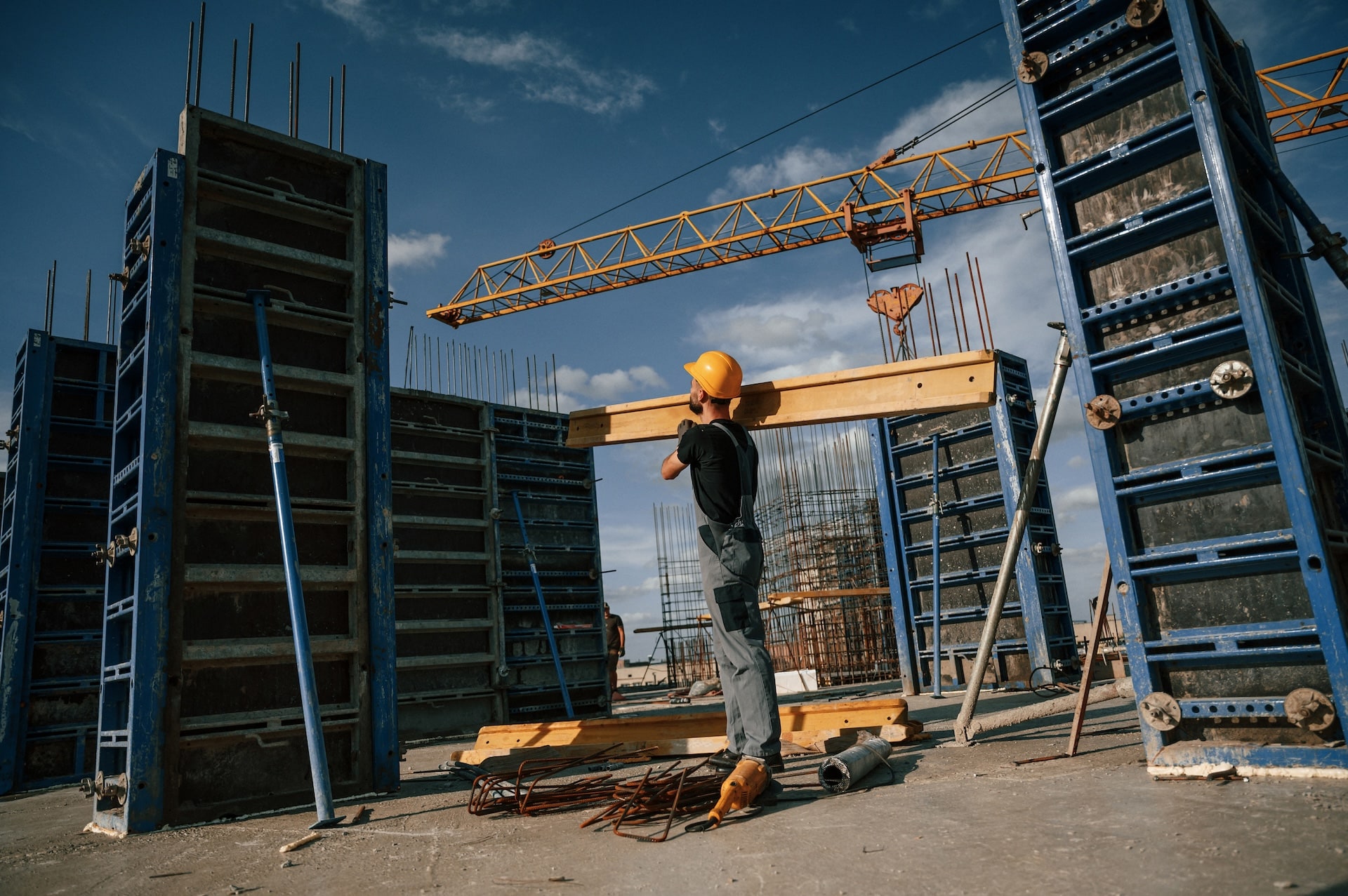 yellow-colored-wooden-plank-man-in-uniform-is-wor-2026-03-09-01-54-13-utc